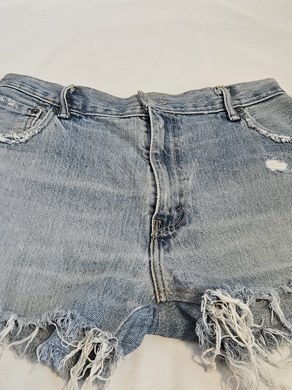 LEVI'S-Light Blue Distressed Denim Women’s Shorts